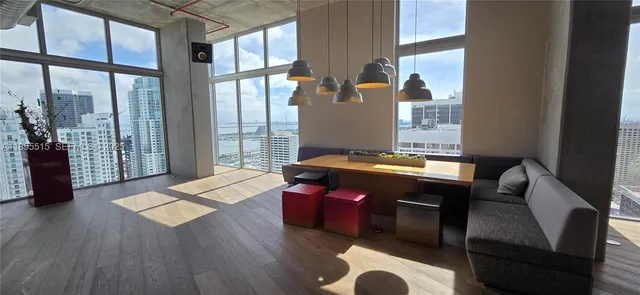 a room with furniture and a window