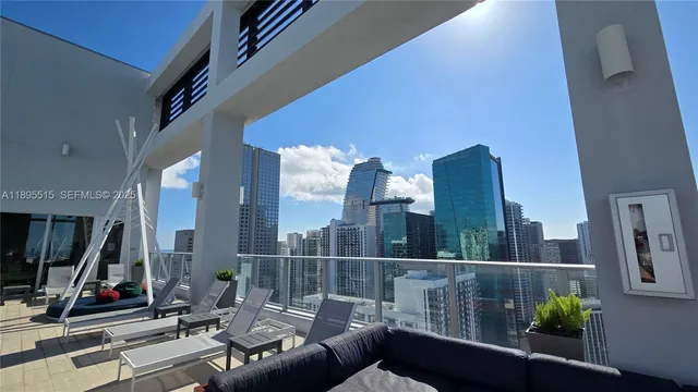 a view of balcony with furniture