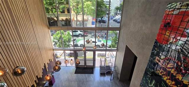 a view of a potted plant in front of a house