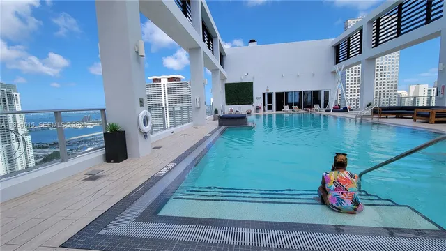 a front view of a house with swimming pool