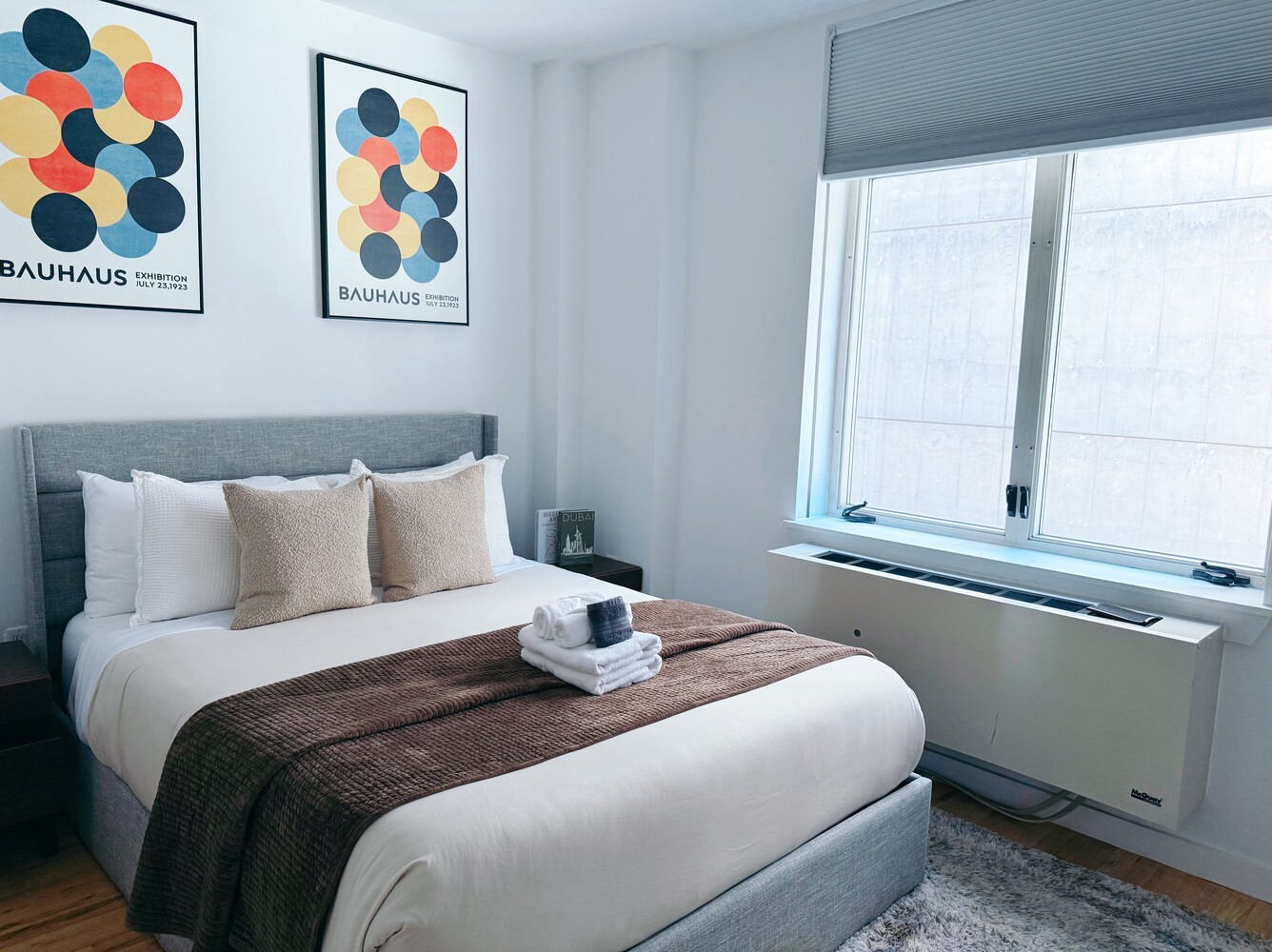 502 9th Avenue, Unit 2B Manhattan, NY 10018 - Photo 4 of 7 a bedroom with a bed and a window