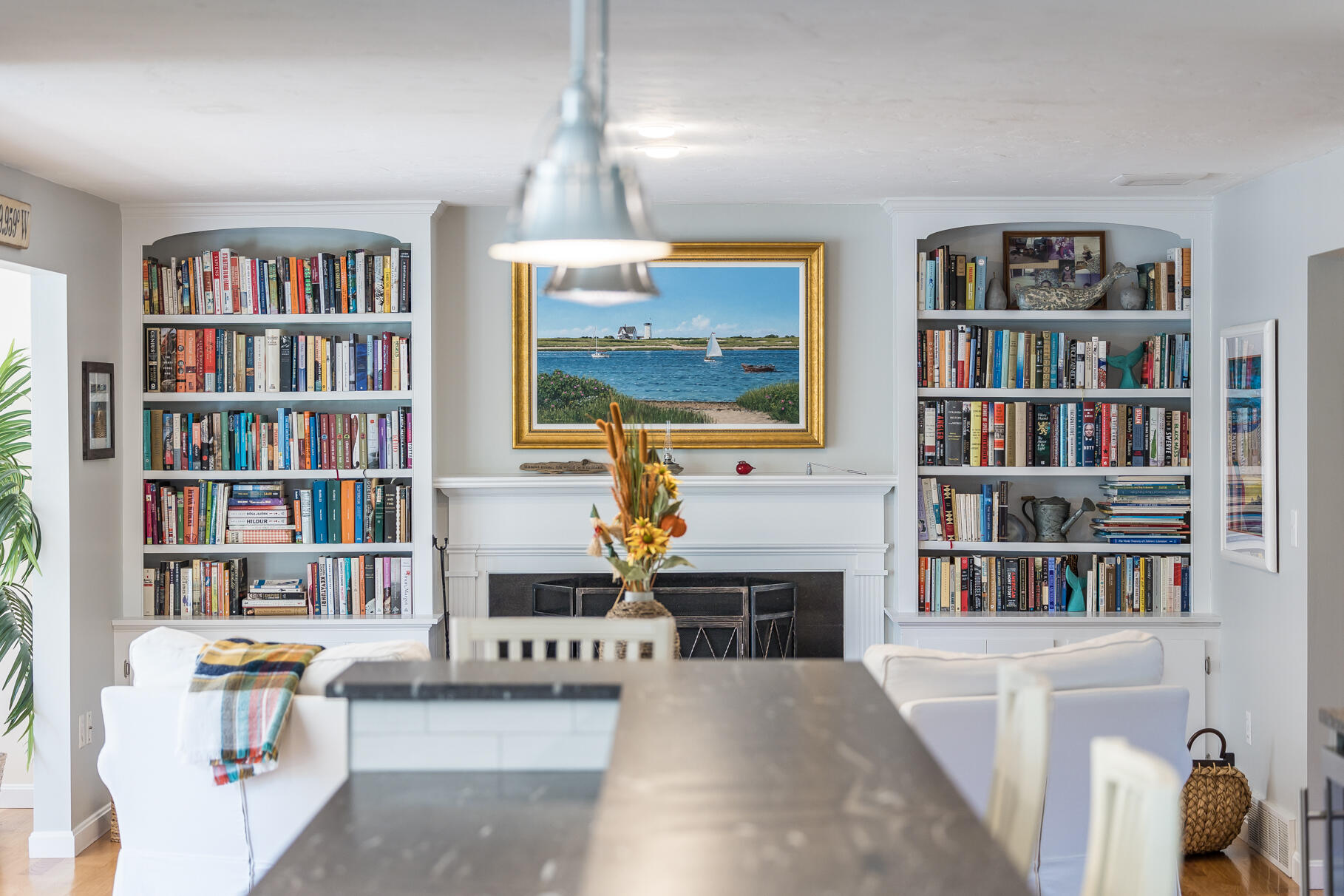 51 North Gate Road Chatham, MA 02633 - Photo 14 of 50 a living room with furniture and a book shelf