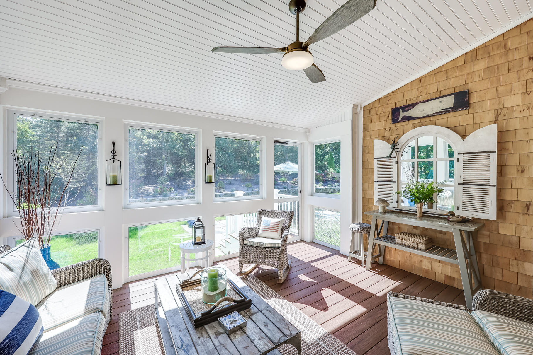 51 North Gate Road Chatham, MA 02633 - Photo 26 of 50 a living room with patio furniture and a large window