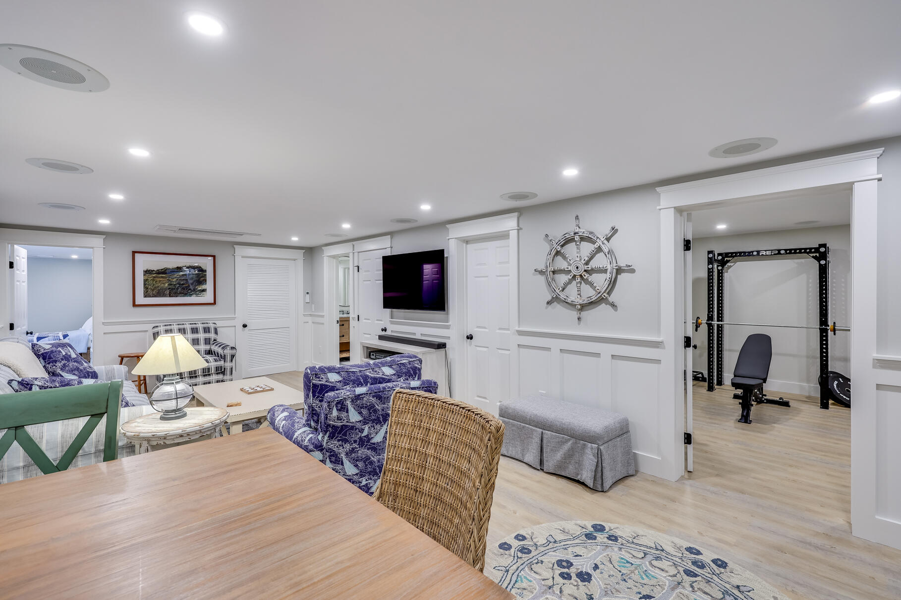 51 North Gate Road Chatham, MA 02633 - Photo 33 of 50 a living room with furniture and a flat screen tv