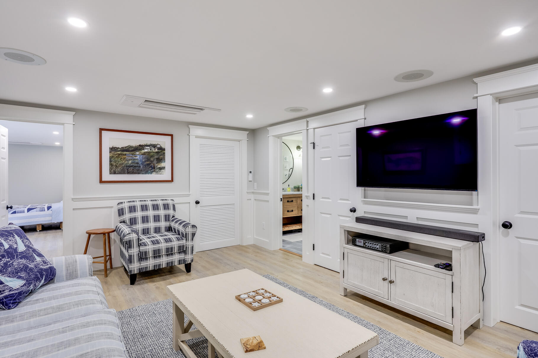 51 North Gate Road Chatham, MA 02633 - Photo 34 of 50 a living room with furniture and a flat screen tv