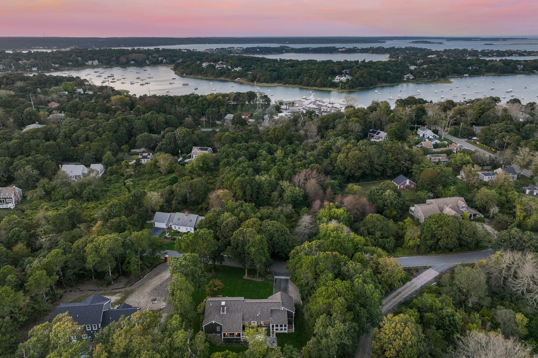 51 North Gate Road Chatham, MA 02633 - Photo 47 of 50 an aerial view of green landscape with trees houses and lake view