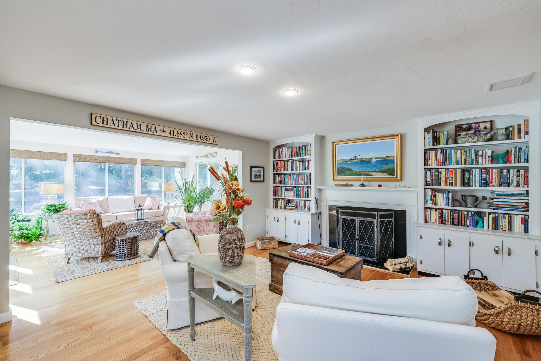 51 North Gate Road Chatham, MA 02633 - Photo 10 of 50 a living room with furniture fireplace and a flat screen tv