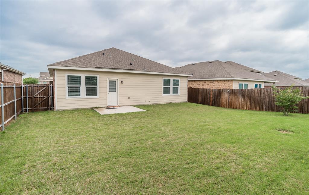 1637 Shadow Hawk Drive Fort Worth, TX 76052 - Photo 18 of 20 a front view of a house with garden