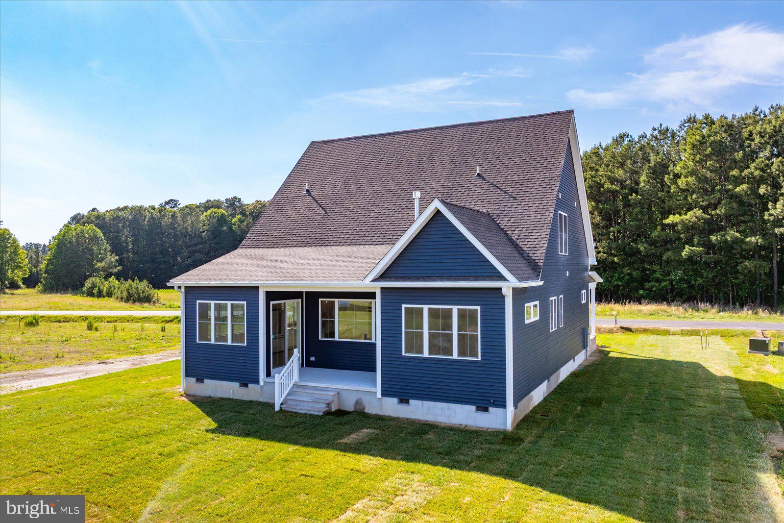 75 King Richard Road Berlin, MD 21811 - Photo 3 of 107 Back of Home with covered patio