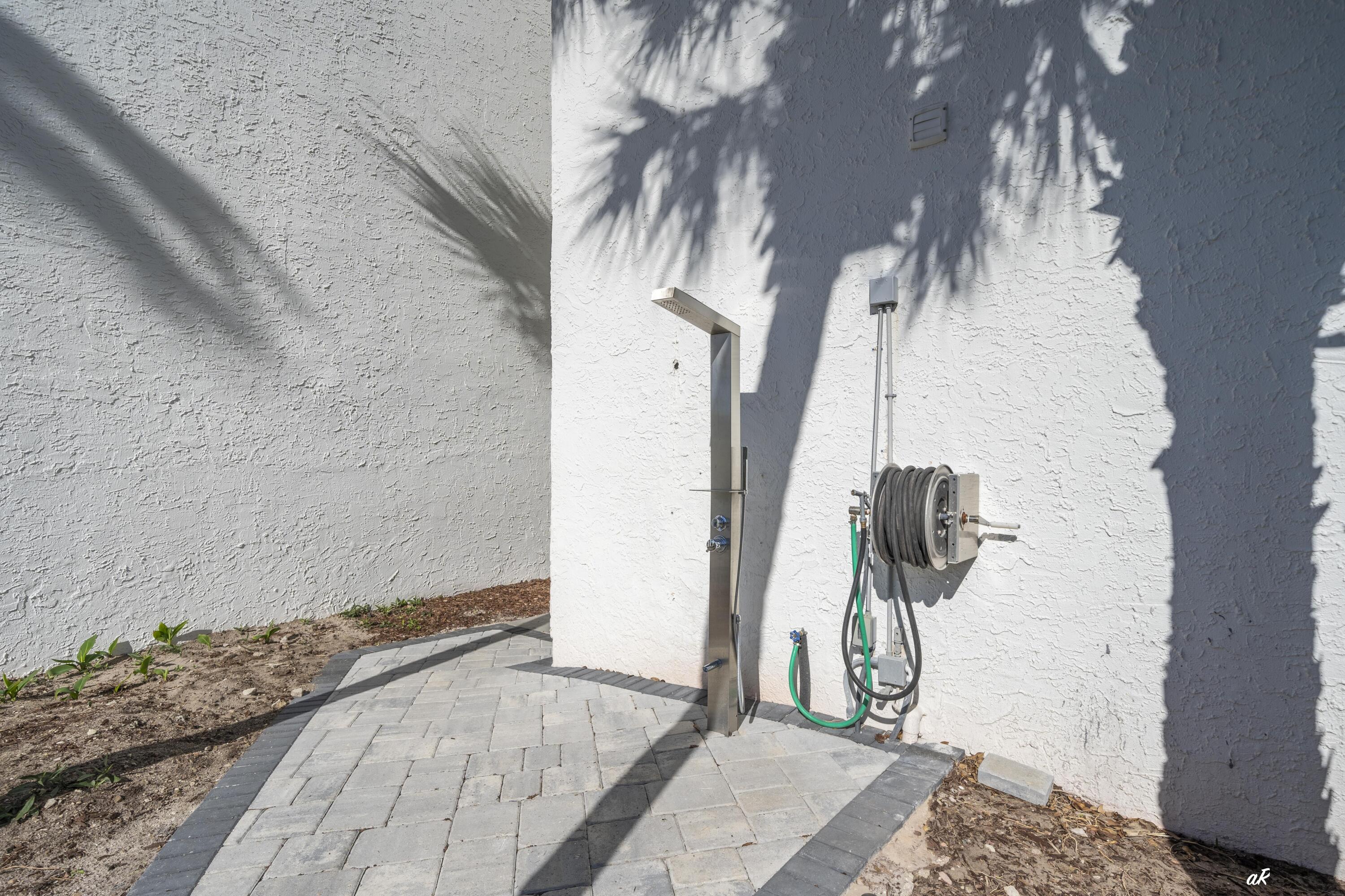 30 Moreno Point Road, Unit 404A Destin, FL 32541 - Photo 26 of 52 Outside shower