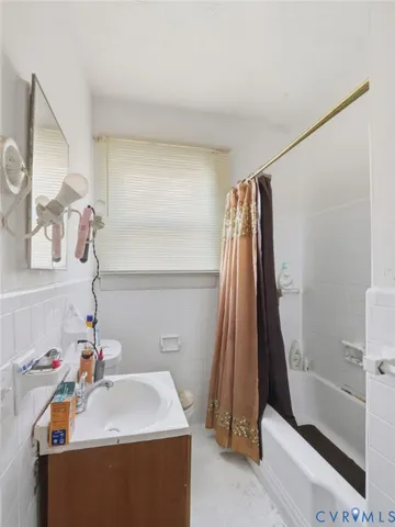 a bathroom with a sink and a tub