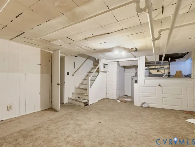 a view of a hallway with cabinet