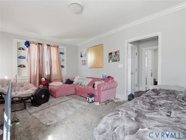 a bedroom with bed and a window