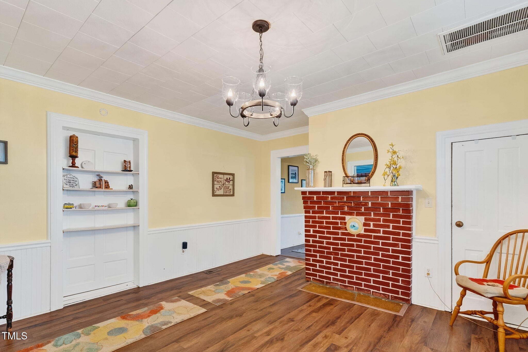 301 2nd Street Spring Hope, NC 27882 - Photo 15 of 49 a view of a livingroom with furniture and wooden floor