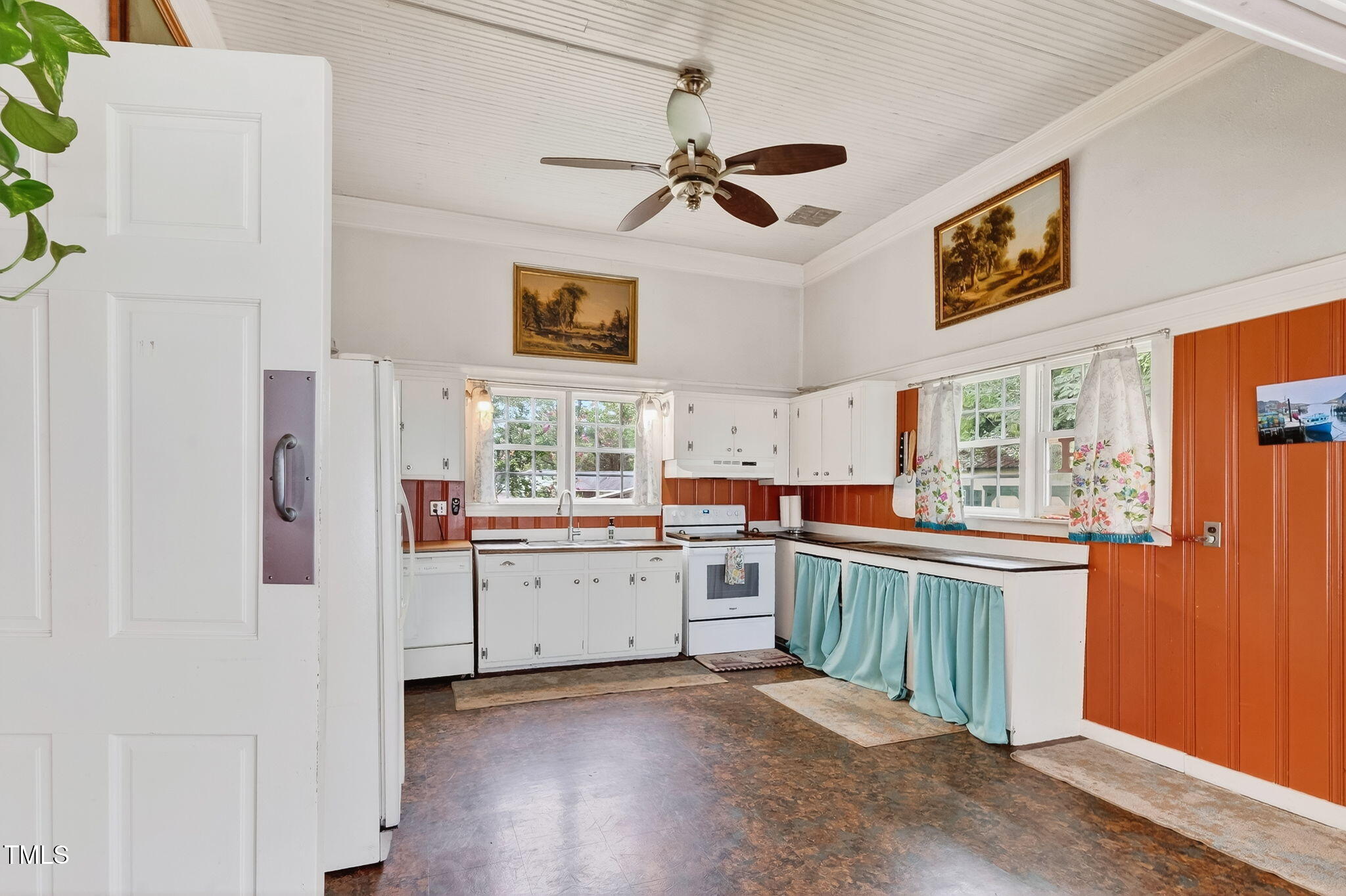 301 2nd Street Spring Hope, NC 27882 - Photo 16 of 49 a kitchen with a cabinets and window