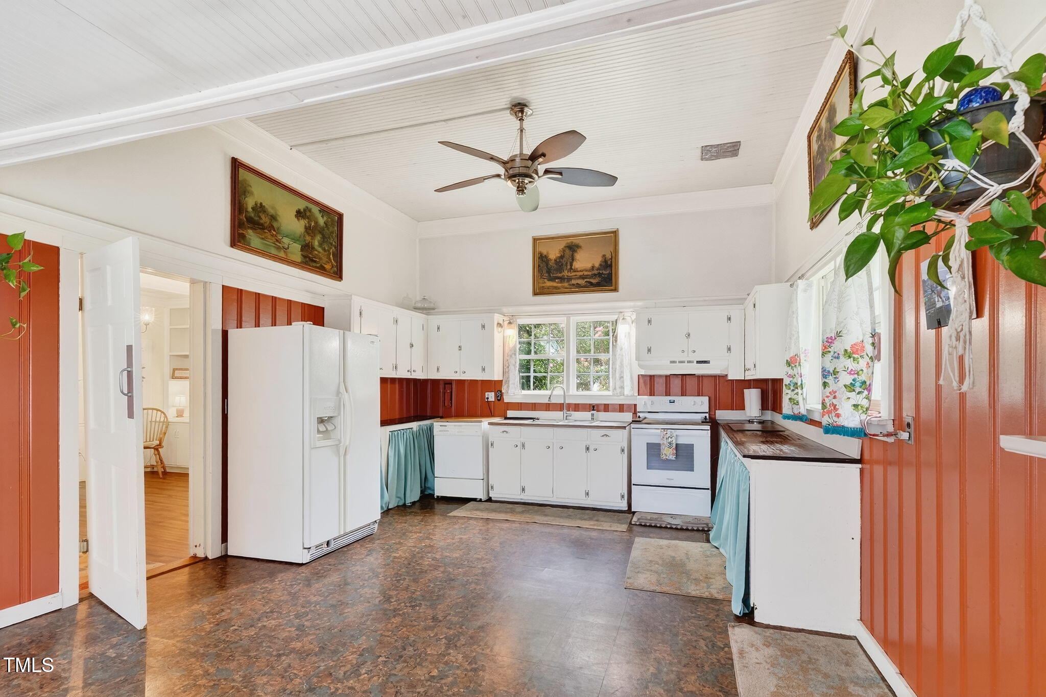 301 2nd Street Spring Hope, NC 27882 - Photo 17 of 49 a kitchen with cabinets and wooden floor