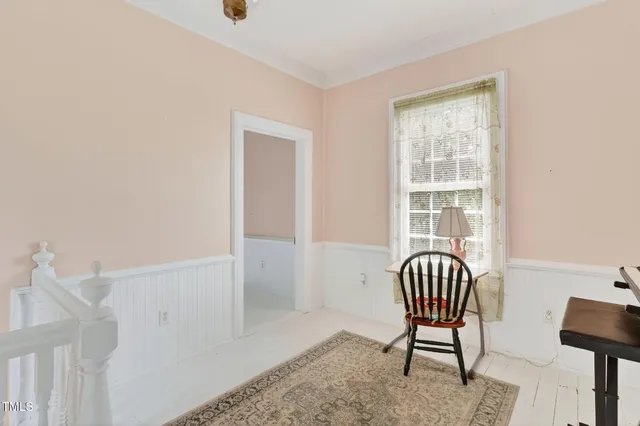 a backyard of a house with seating space