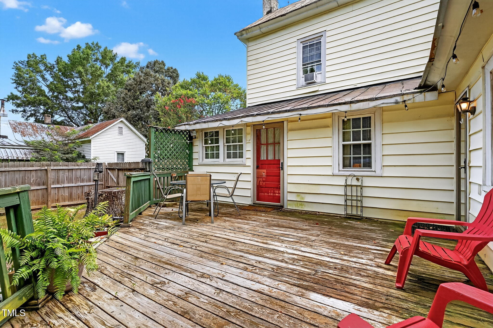 301 2nd Street Spring Hope, NC 27882 - Photo 39 of 49 a backyard of a house with seating space