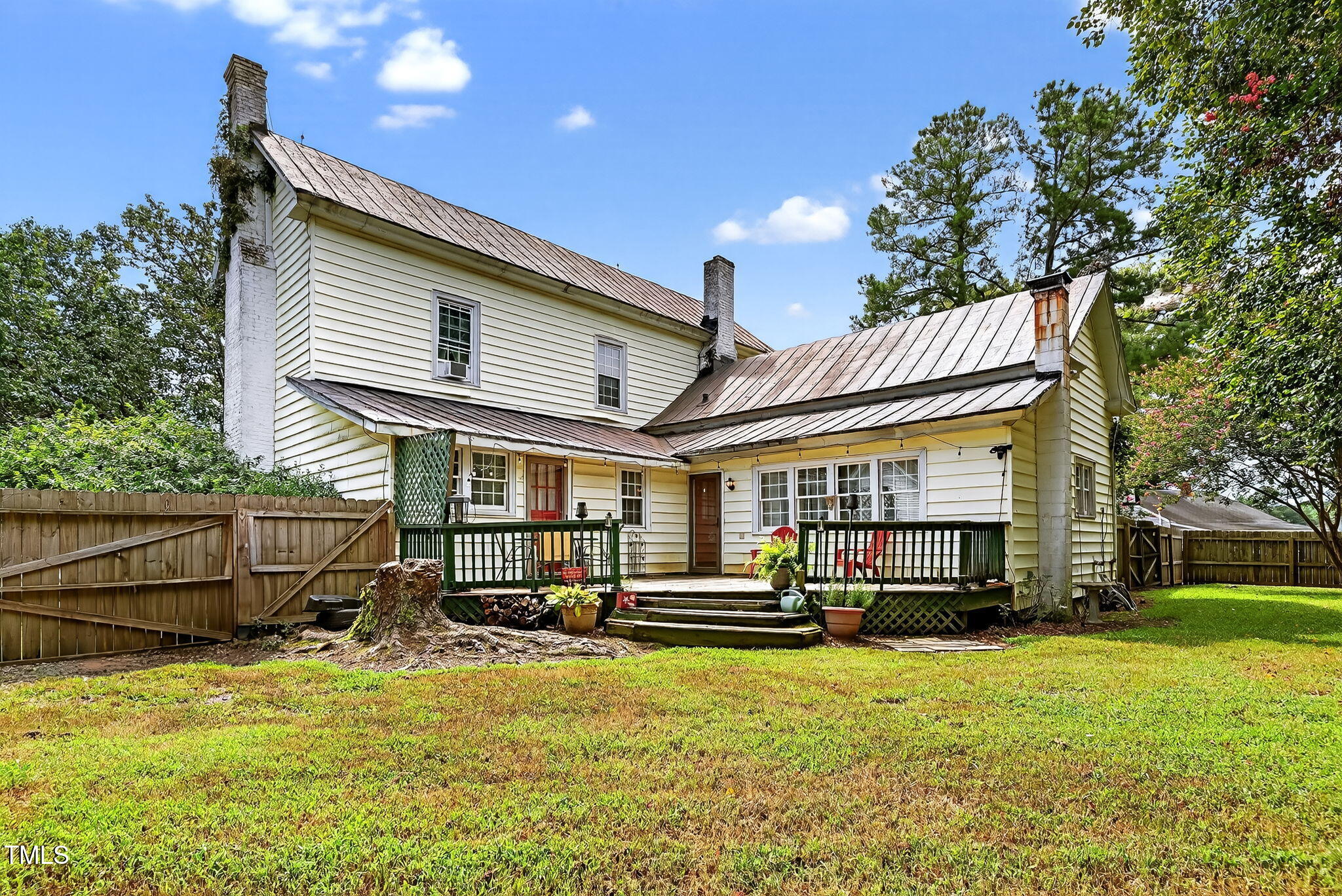 301 2nd Street Spring Hope, NC 27882 - Photo 40 of 49 a view of a house with swimming pool and porch