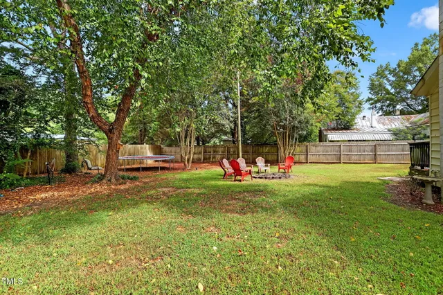 an aerial view of a house with a garden