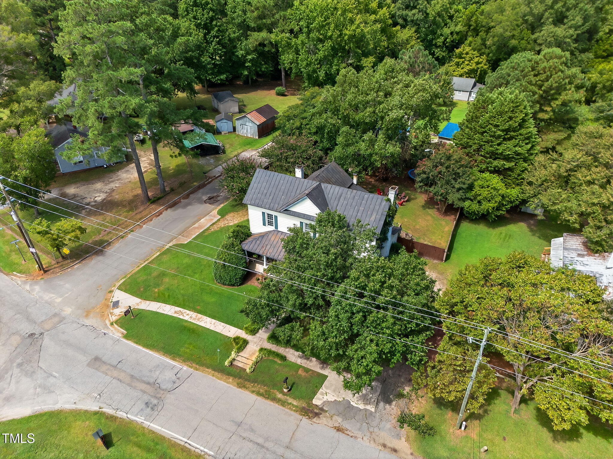 301 2nd Street Spring Hope, NC 27882 - Photo 45 of 49 an aerial view of a house with yard swimming pool and outdoor seating