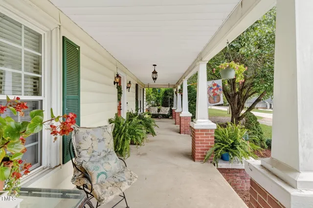 a lobby with furniture and garden