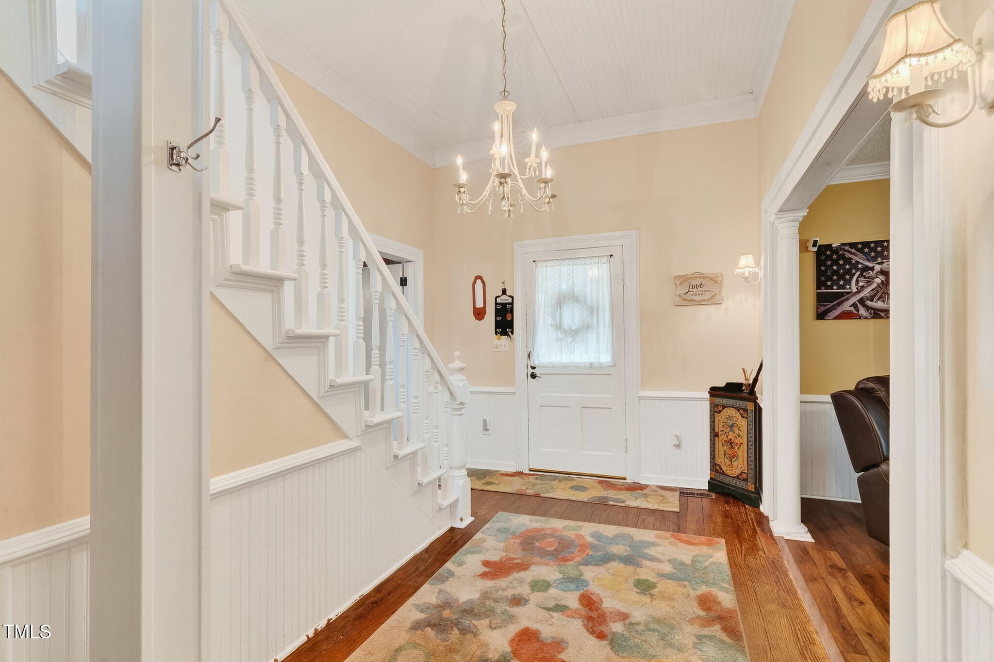 301 2nd Street Spring Hope, NC 27882 - Photo 9 of 49 a view of an entryway with wooden floor and a livingroom view