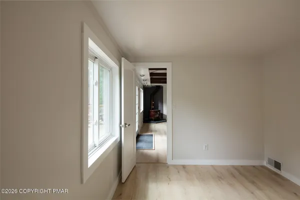 an empty room with windows