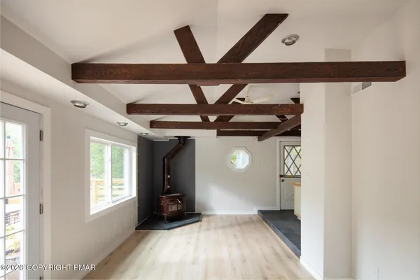 a view of an empty room and window