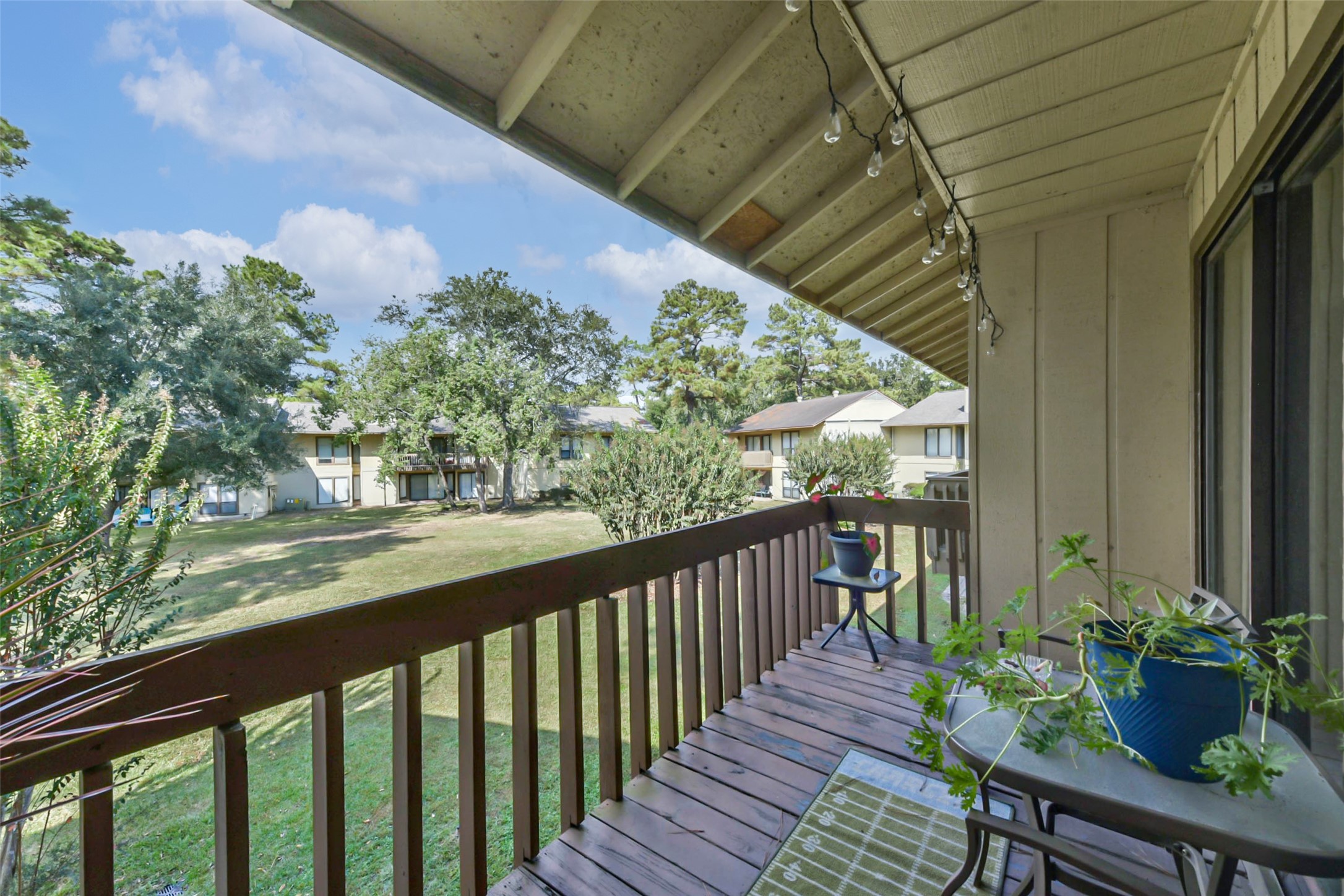 15919 Golf Club Drive, Unit 215 Crosby, TX 77532 - Photo 11 of 16 a view of a balcony with chairs