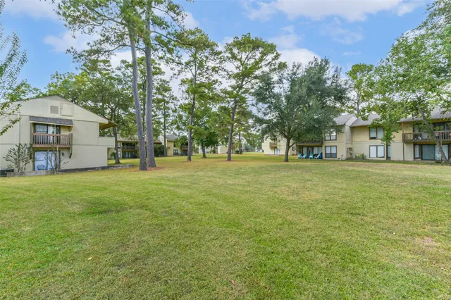 a view of a house with a big yard