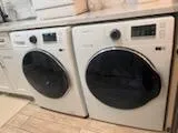 a close up view of a washer and dryer
