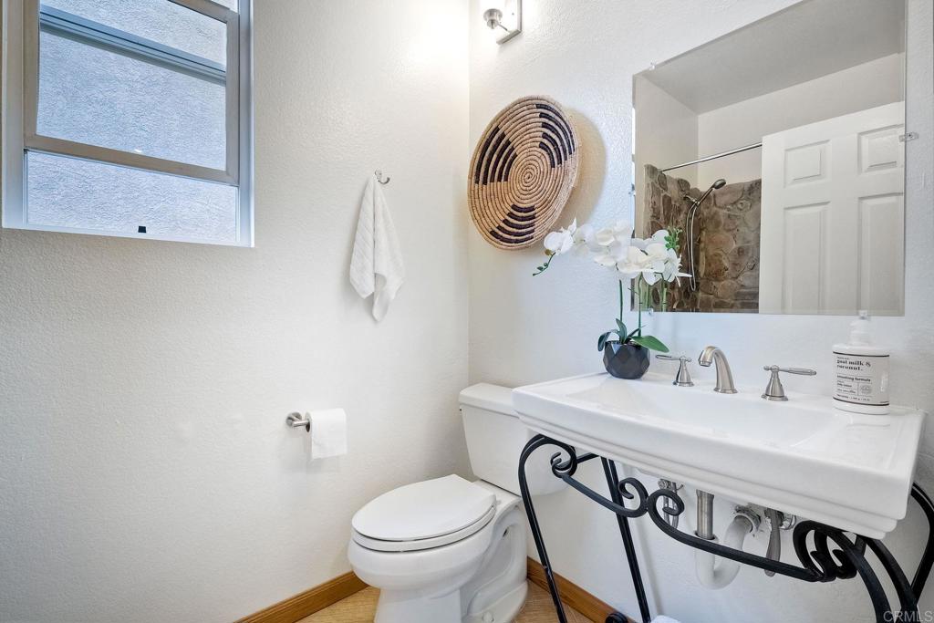 1120 Lassen Peak Place Chula Vista, CA 91913 - Photo 16 of 48 a bathroom with a sink and a mirror