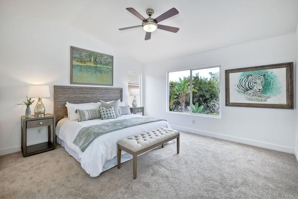 1120 Lassen Peak Place Chula Vista, CA 91913 - Photo 26 of 48 a bedroom with a large bed and a window