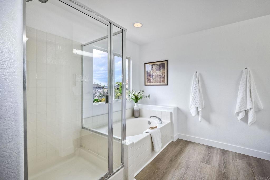 1120 Lassen Peak Place Chula Vista, CA 91913 - Photo 30 of 48 a bathroom with a tub and shower