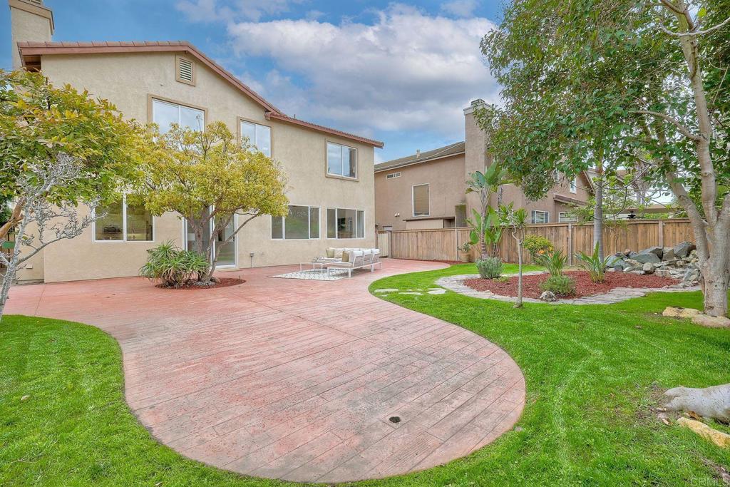1120 Lassen Peak Place Chula Vista, CA 91913 - Photo 35 of 48 a view of a house with a backyard porch and sitting area