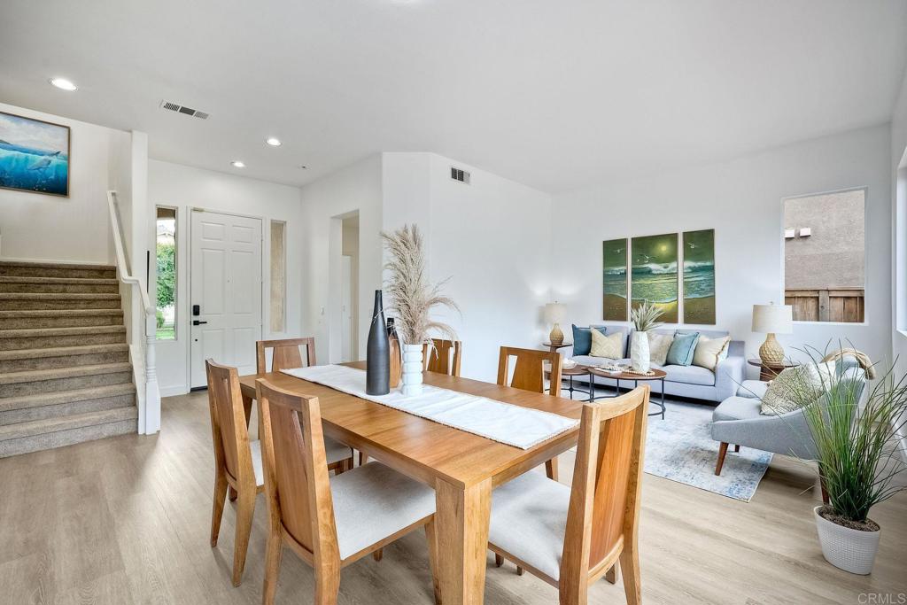 1120 Lassen Peak Place Chula Vista, CA 91913 - Photo 5 of 48 a view of a dining room with furniture and wooden floor