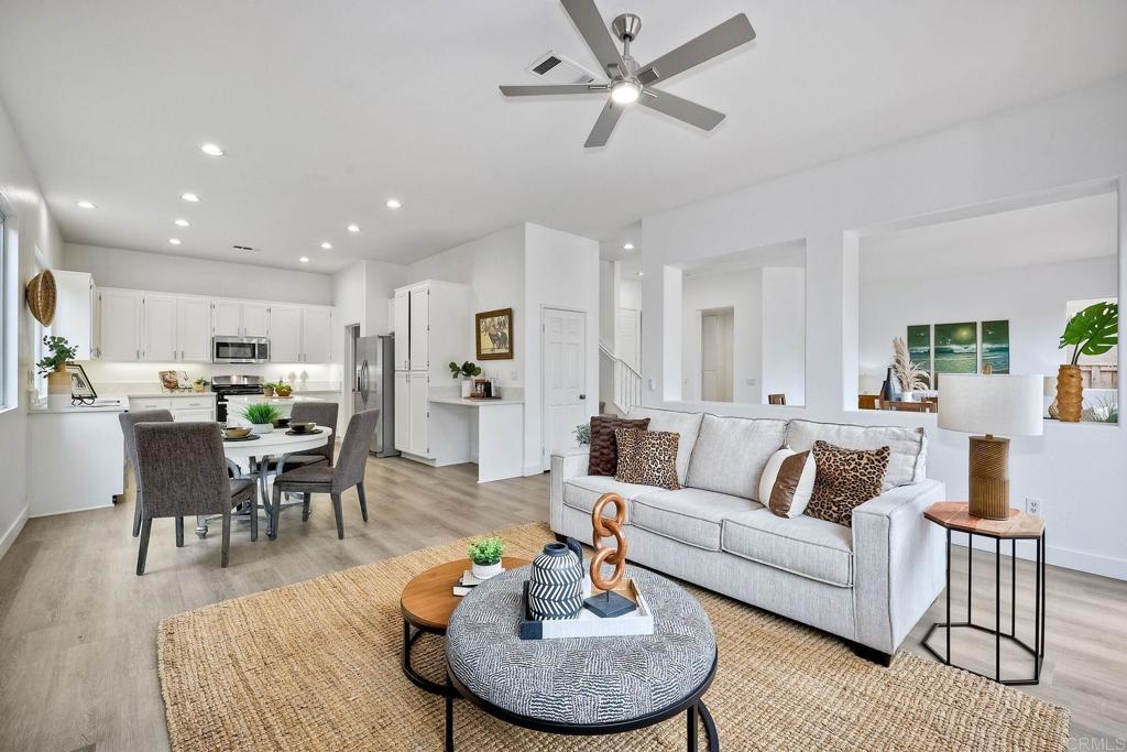 1120 Lassen Peak Place Chula Vista, CA 91913 - Photo 10 of 48 a living room with furniture kitchen view and a dining table