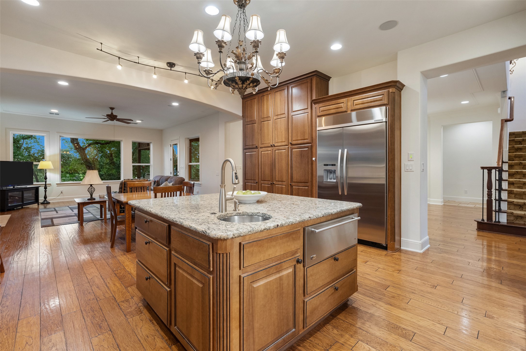 9308 Travertine Cove Austin, TX 78735 - Photo 13 of 40 a kitchen with a counter space a sink appliances and cabinets