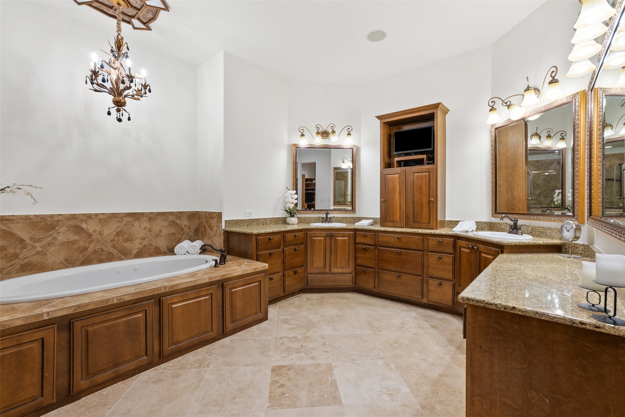 9308 Travertine Cove Austin, TX 78735 - Photo 20 of 40 a room with a sink and a mirror