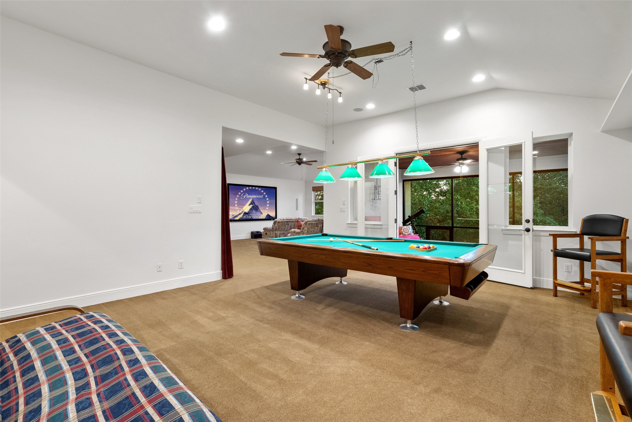 9308 Travertine Cove Austin, TX 78735 - Photo 33 of 40 a room with pool table and windows