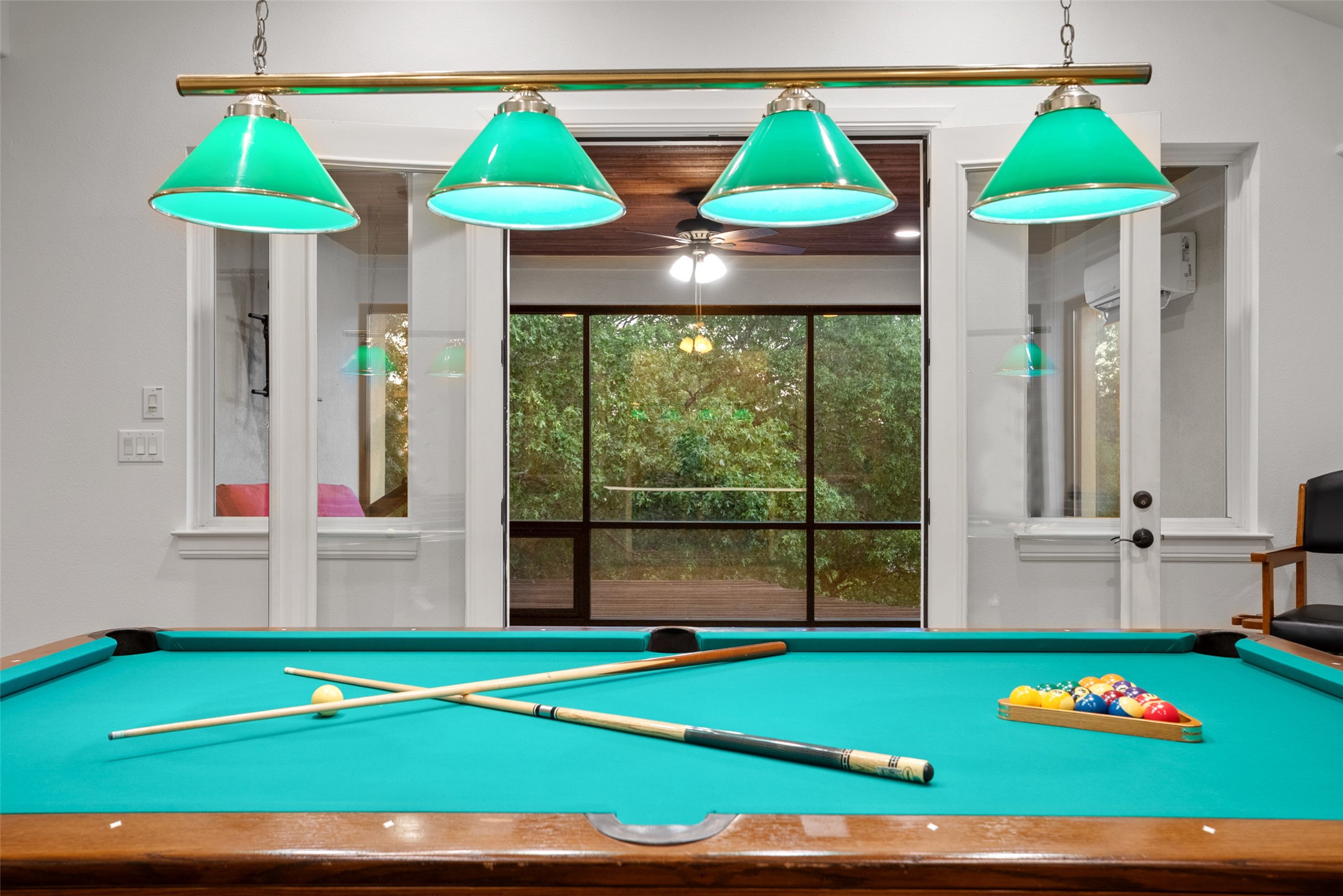 9308 Travertine Cove Austin, TX 78735 - Photo 34 of 40 a room that has a table and a chandelier