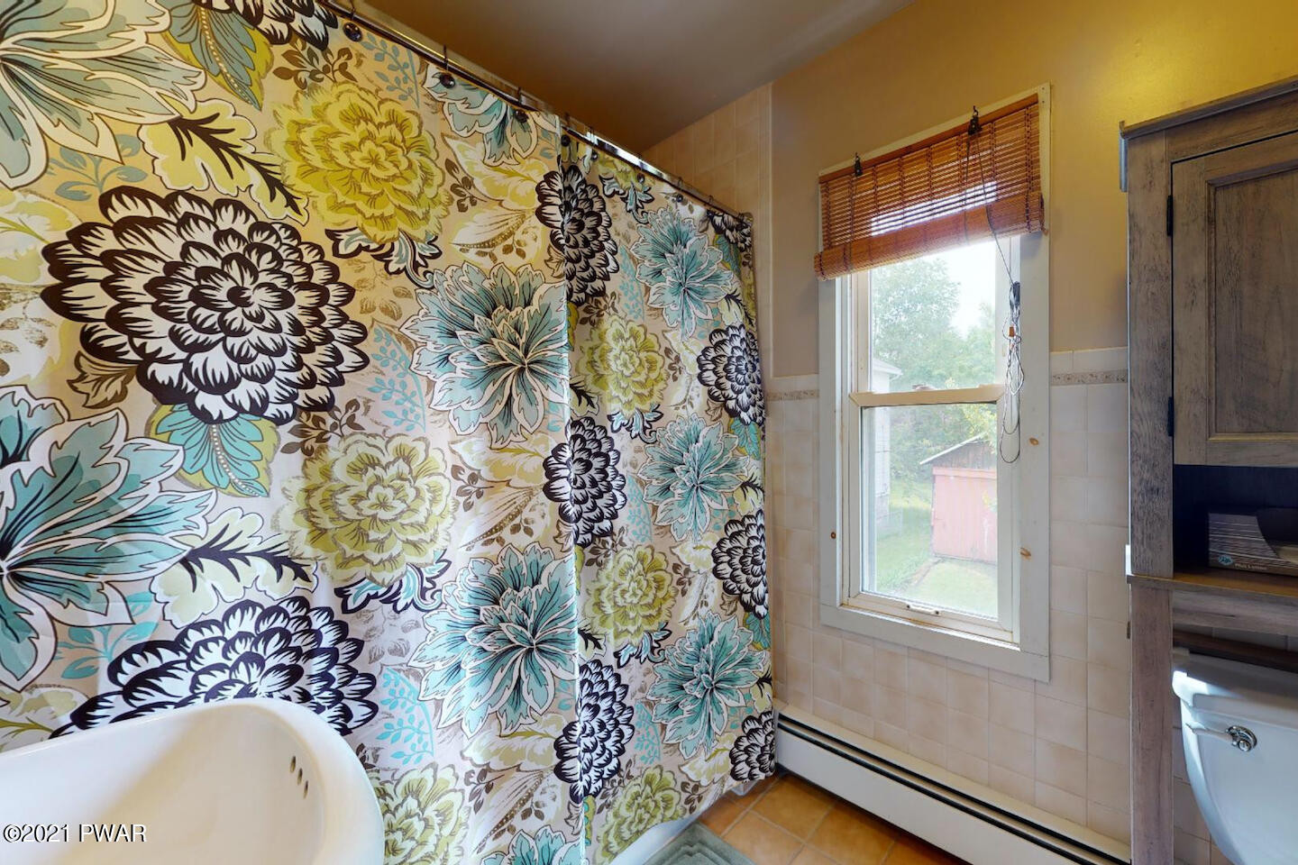 20 Pond Road Moscow, PA 18444 - Photo 45 of 59 a bathroom with a bathtub and shower curtain