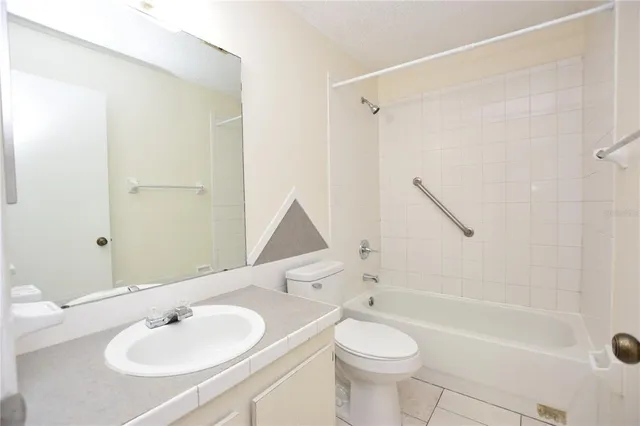 a room with furniture and a book shelf