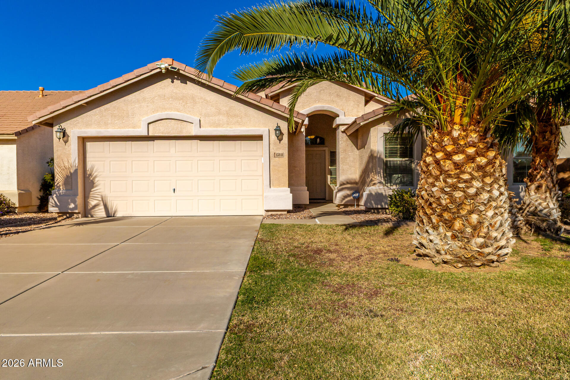 45144 West Desert Garden Road Maricopa, AZ 85139 - Photo 16 of 52 a view of a house with a yard