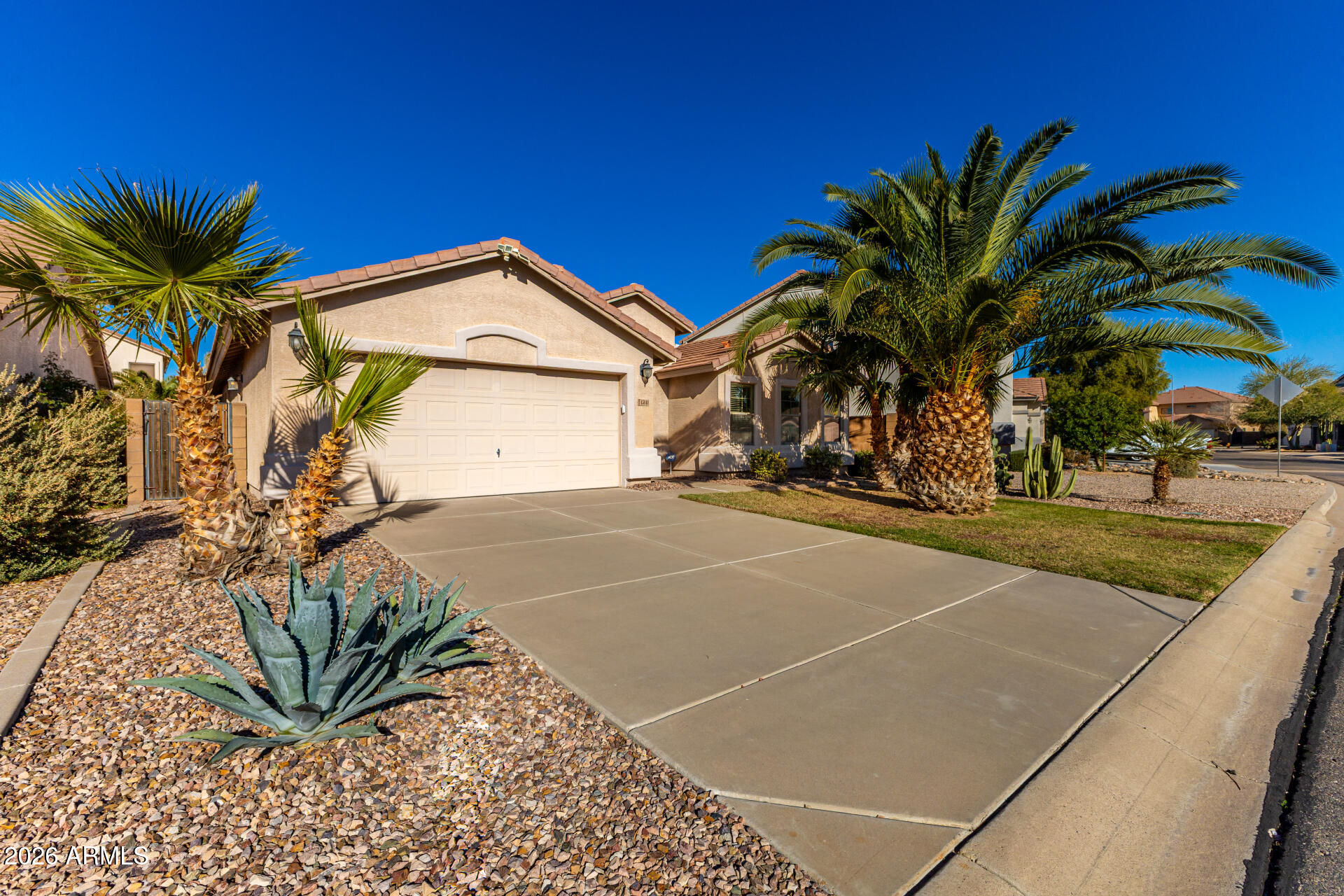 45144 West Desert Garden Road Maricopa, AZ 85139 - Photo 18 of 52 a view of a house with a outdoor space