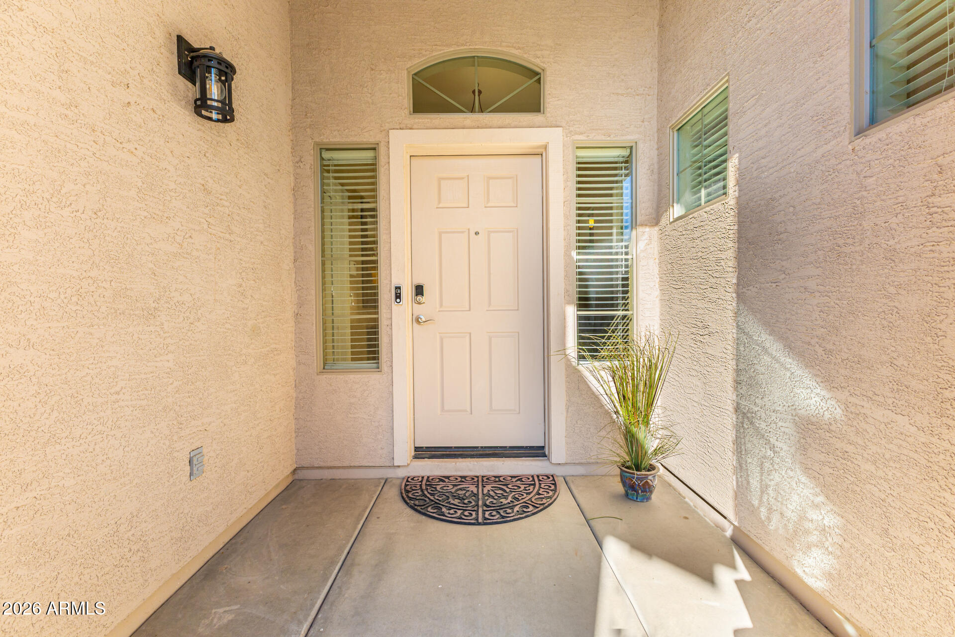 45144 West Desert Garden Road Maricopa, AZ 85139 - Photo 20 of 52 a view of a entryway door with wooden floor