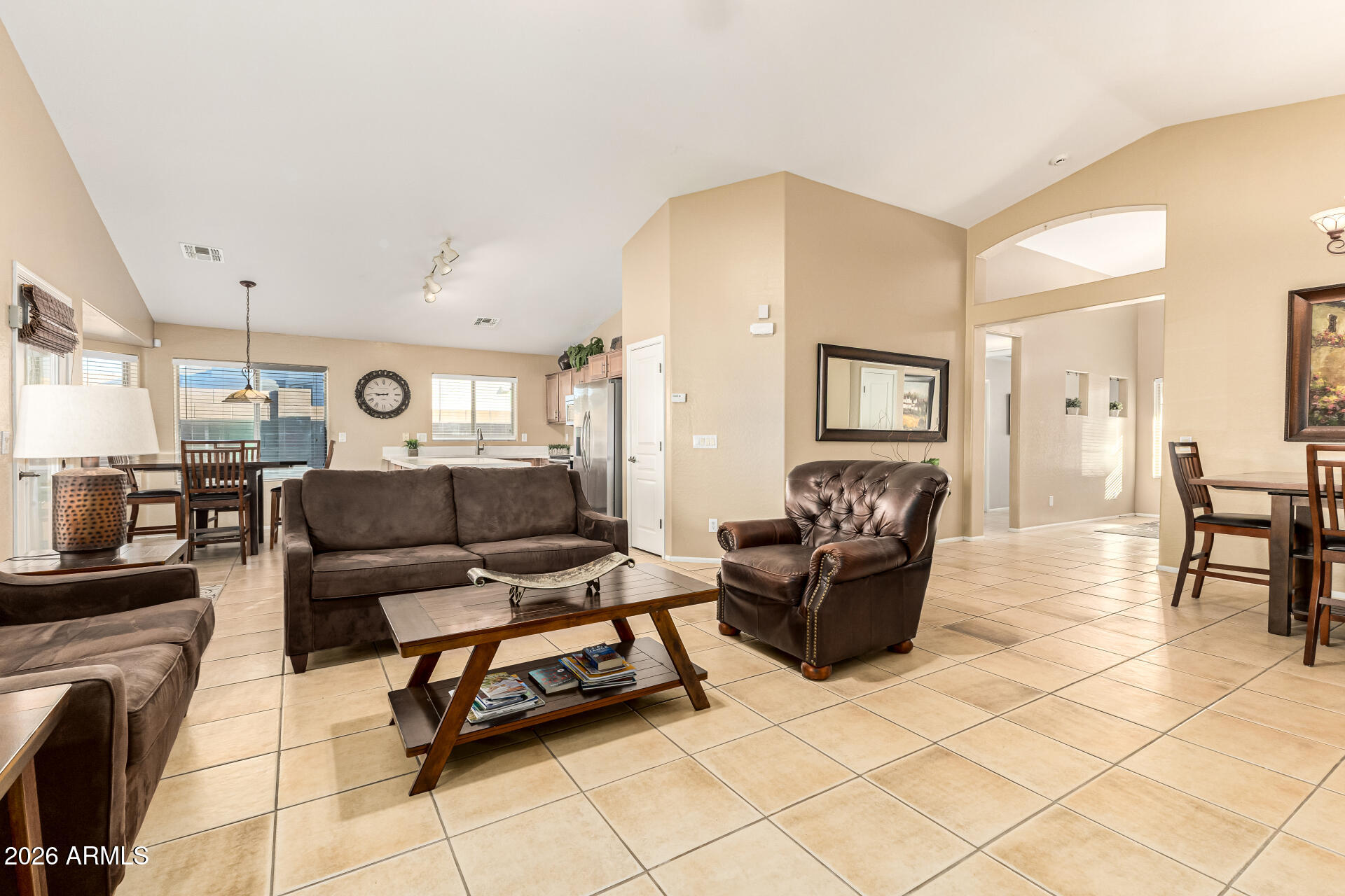 45144 West Desert Garden Road Maricopa, AZ 85139 - Photo 3 of 52 a living room with furniture and wooden floor