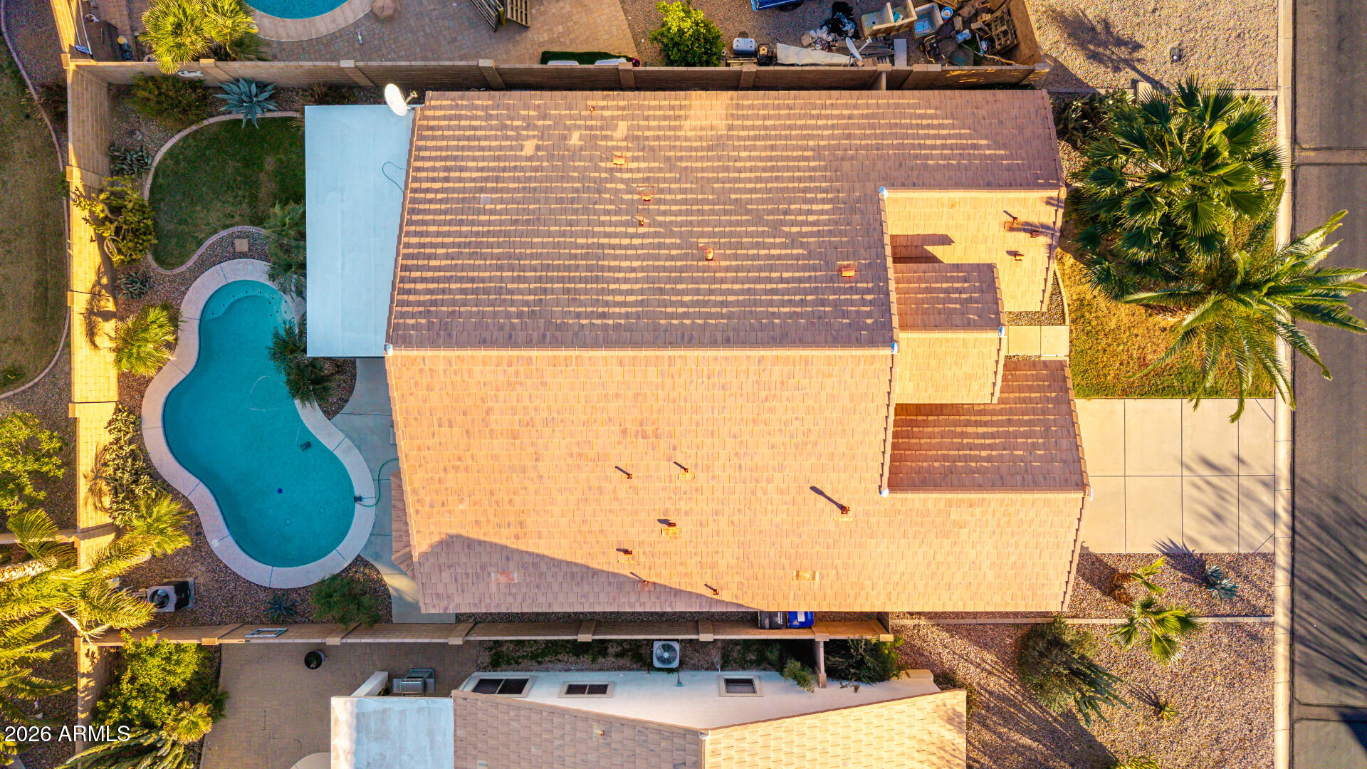45144 West Desert Garden Road Maricopa, AZ 85139 - Photo 37 of 52 a view of a swimming pool with a patio