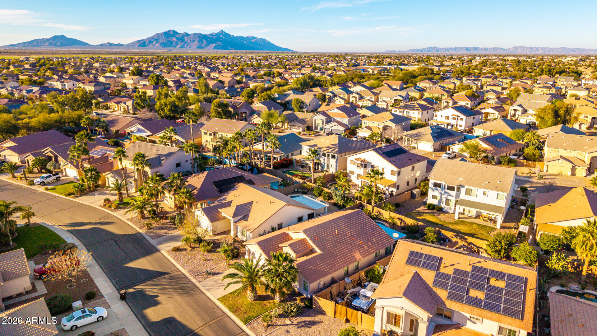 45144 West Desert Garden Road Maricopa, AZ 85139 - Photo 40 of 52 an aerial view of a house with a lake